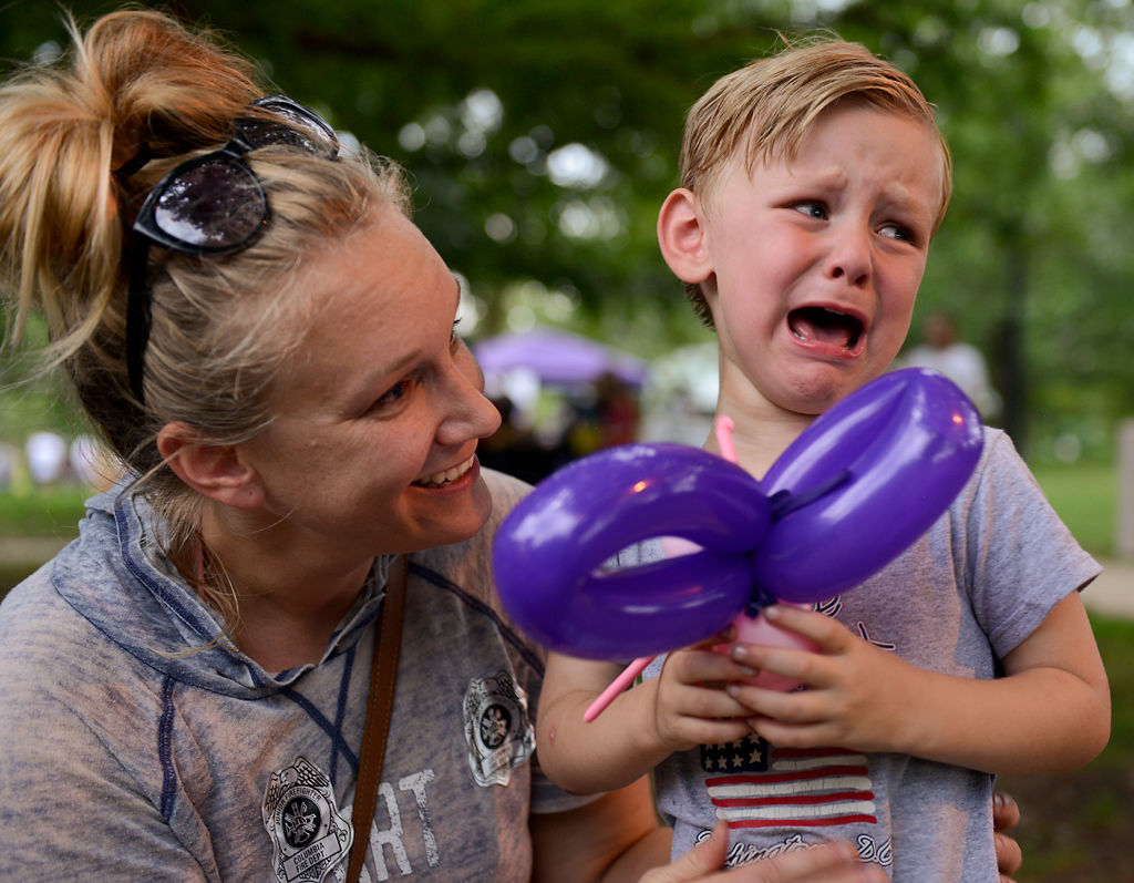 Ban Pallardy, 4, cries after two wings